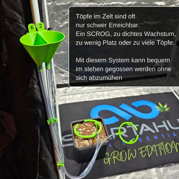 Close-up of a green funnel irrigation system for grow tents with labeled tubes and hydroponic plant setup inside.