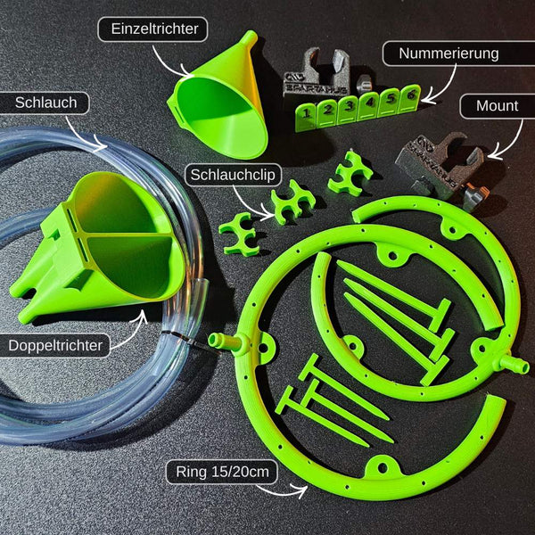 Green drip irrigation parts and accessories for grow box watering system with tubes, funnels, clips, and mounting rings